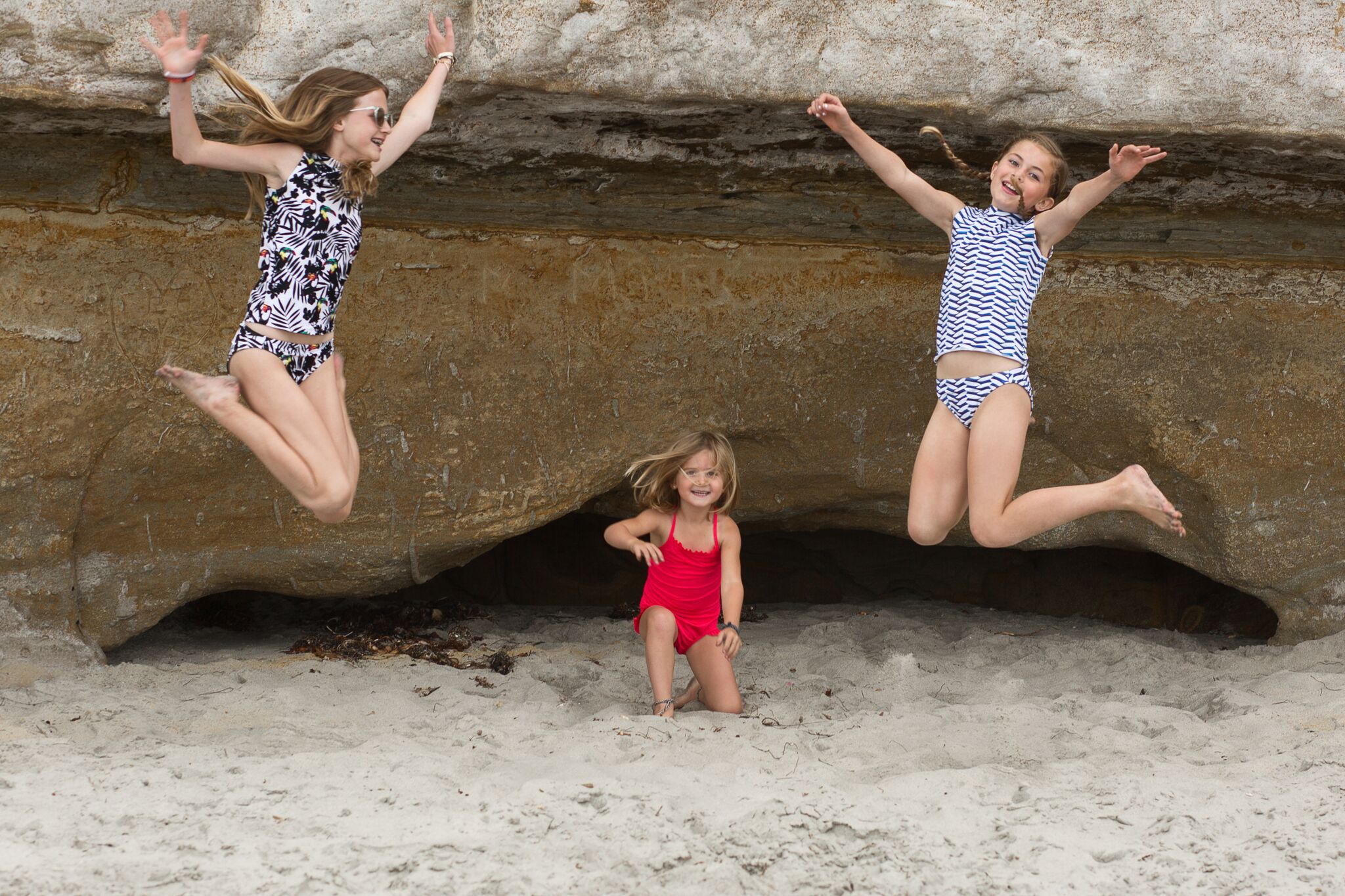 Lisa Allen's kids wearing modest one piece swim suits 