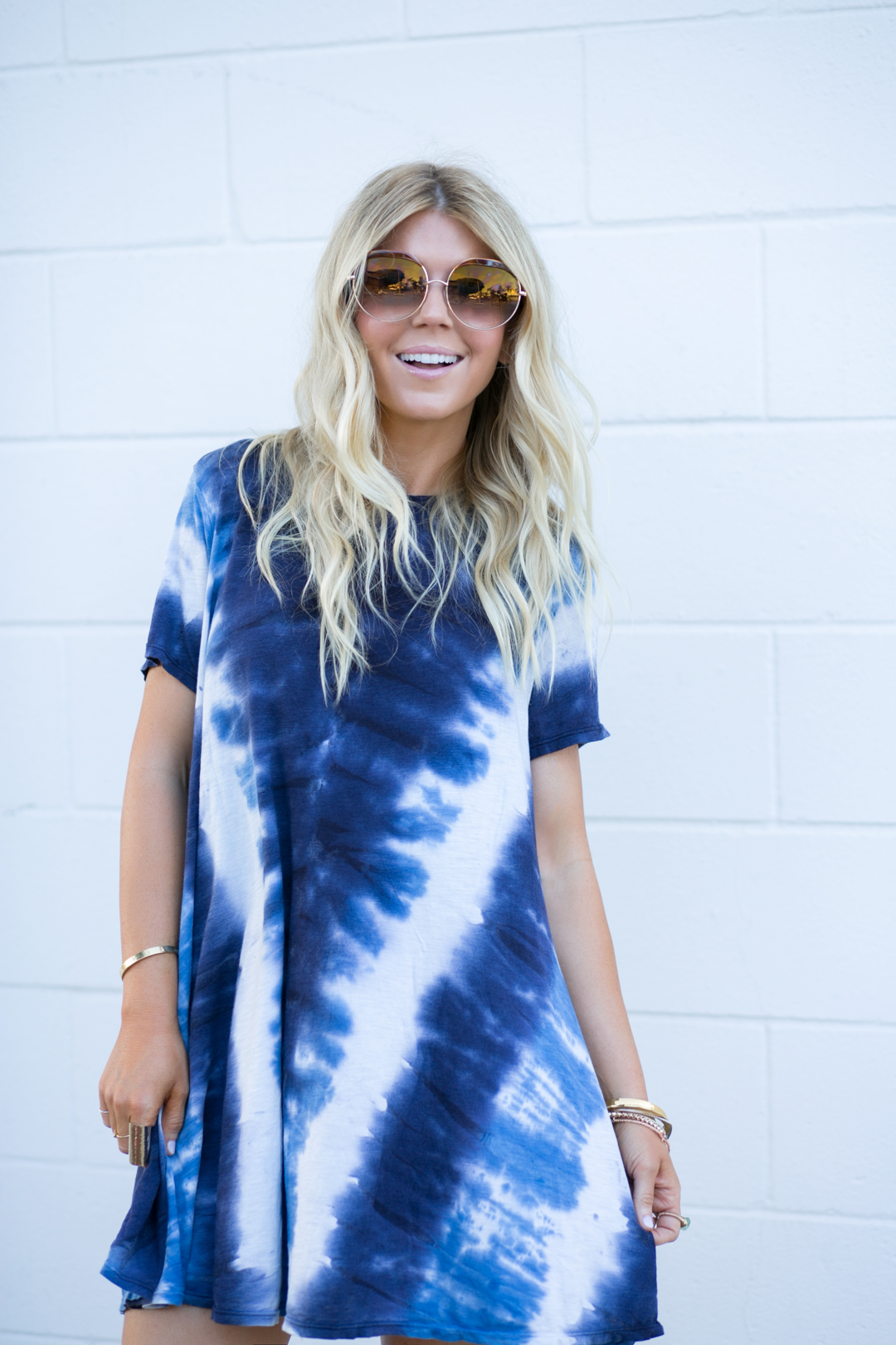 Lisa Allen of Lunchpails and Lipstick wearing a blue and white tie dye dress from Show Me Your Mumu and Alexander Wang Platforms