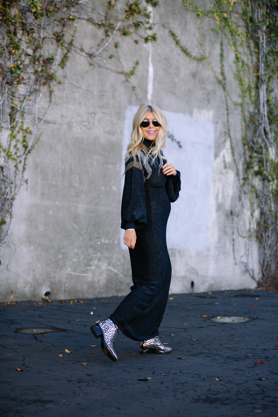 Lisa Allen of Lunchpails and Lipstick wearing a free people maxi dress with alexander wang studded booties and wild fox sunglasses