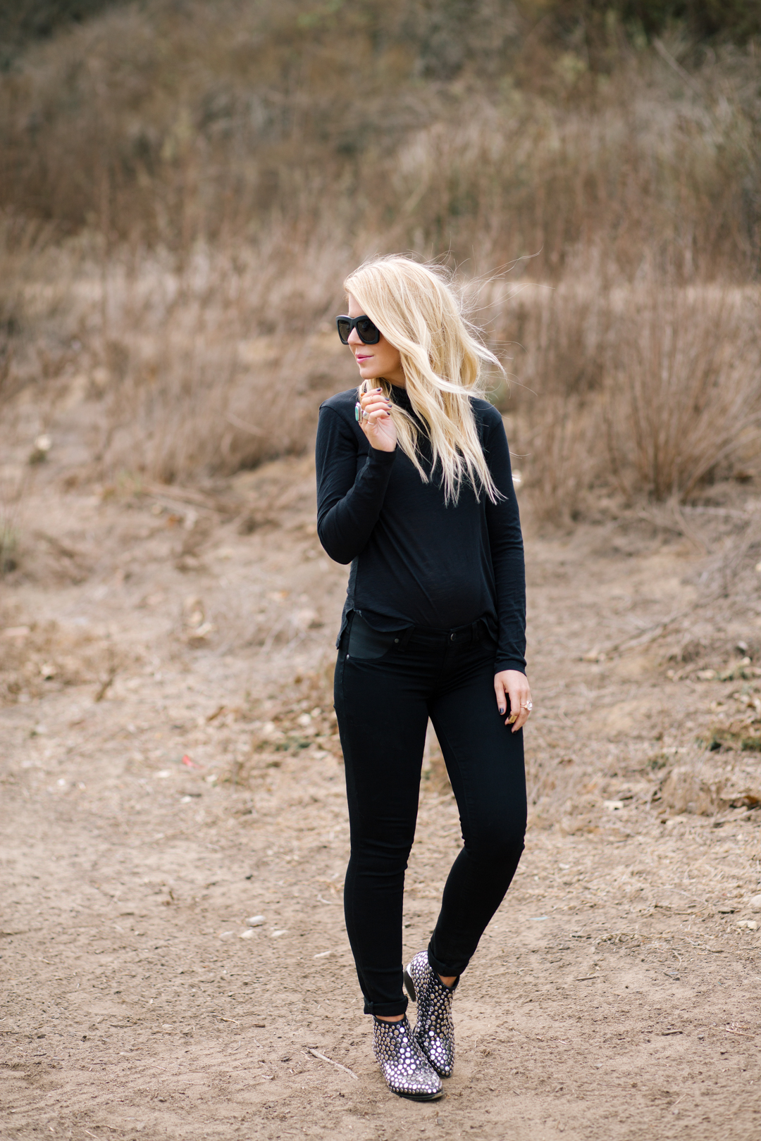 Lisa Allen of Lunchpails and lipstick wearing all black madewell with studded alexander wang booties and valley eyewear 