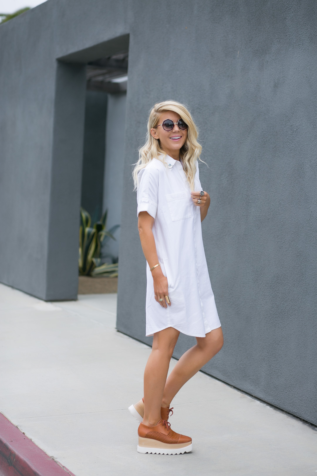 lisa allen of lunchpail and lipstick wearing a white madewell dress and stella mccartney platforms in solana beach, CA 
