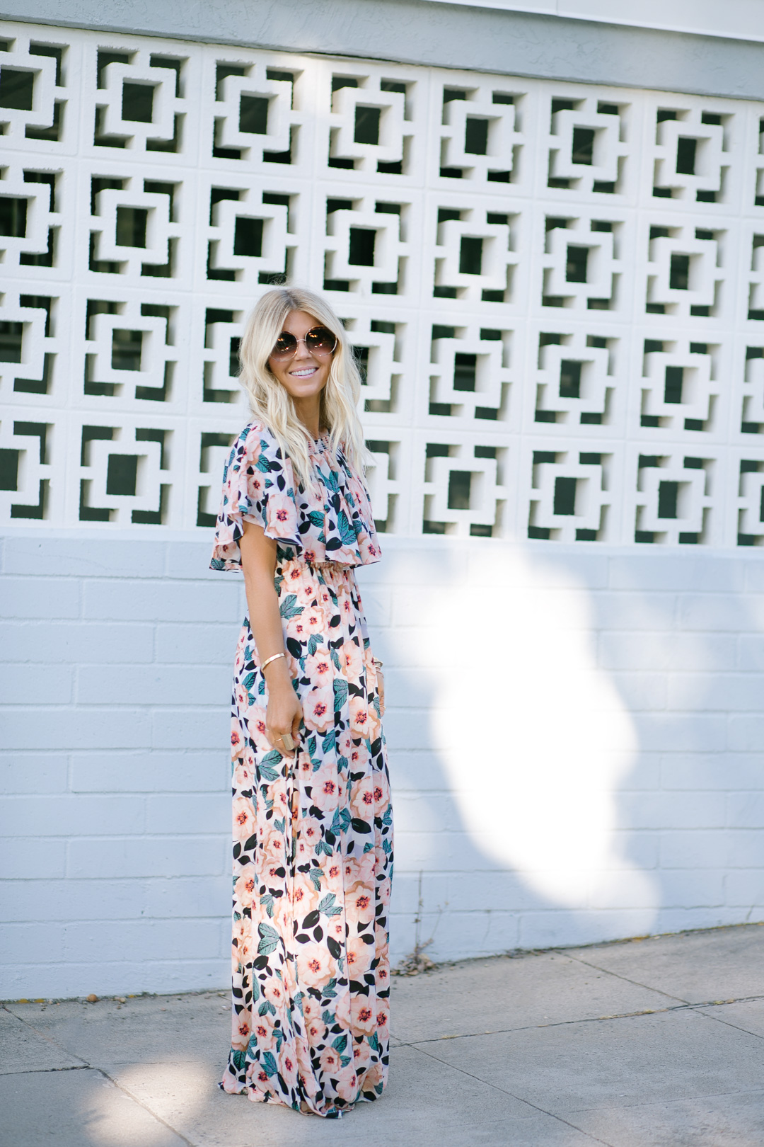 Lisa Allen of Lunchpails and Lipstick wearing a floral maxi dress by Show me your mumu and prada platforms in Encinitas, CA 