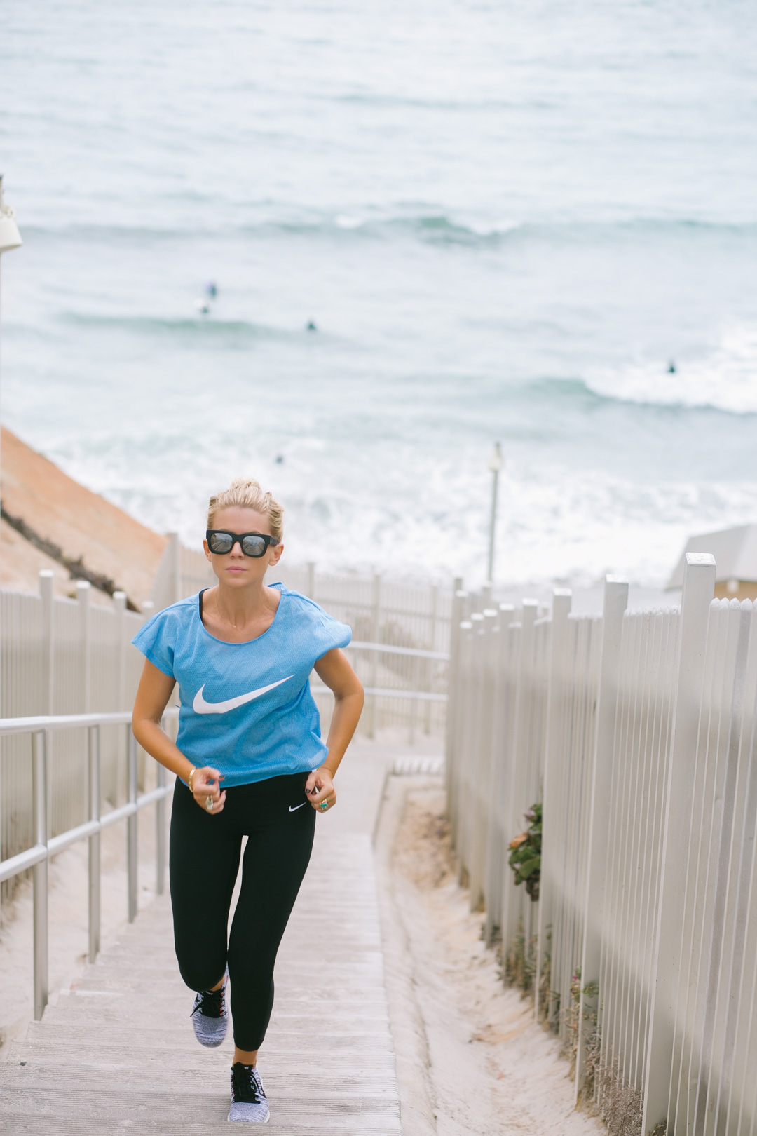 Lisa Allen of LunchPails and Lipstick running stairs at the beach in Solana Beach, CA wearing Nike Free and Nike gear