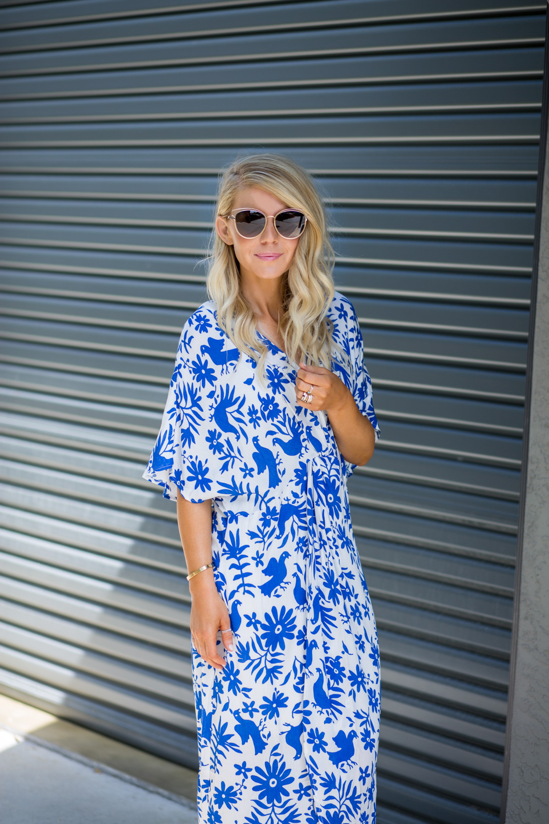 Lisa Allen of Lunchpails and Lipstick wearing a blue and white Show Me Your Mumu twist front dress and Alexander Wang Platforms with Dior Gold Sunglasses